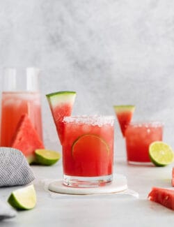 a salt-rimmed glass of watermelon margarita