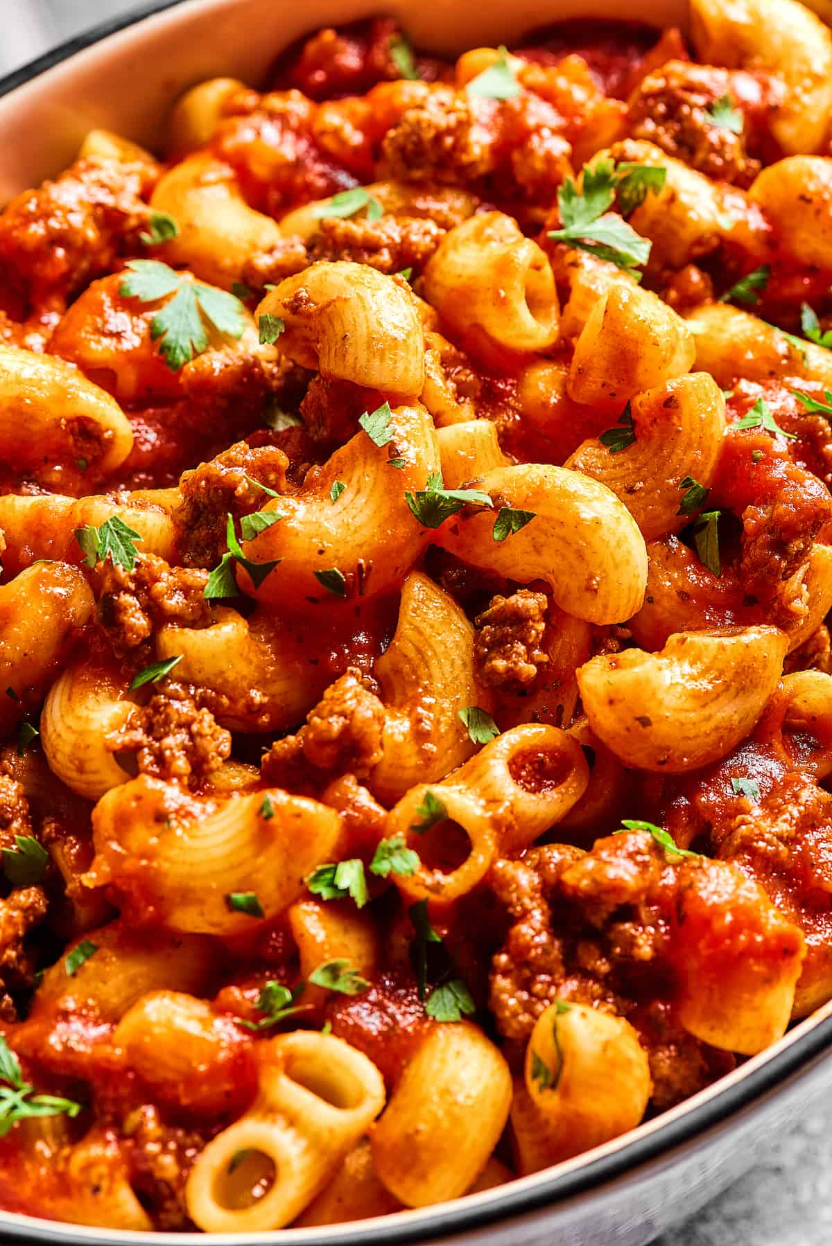 Overhead view of homemade beefaroni in a baking dish