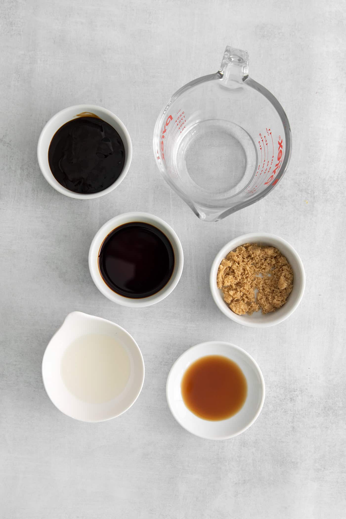Overhead view of ingredients needed for pad woon sen sauce