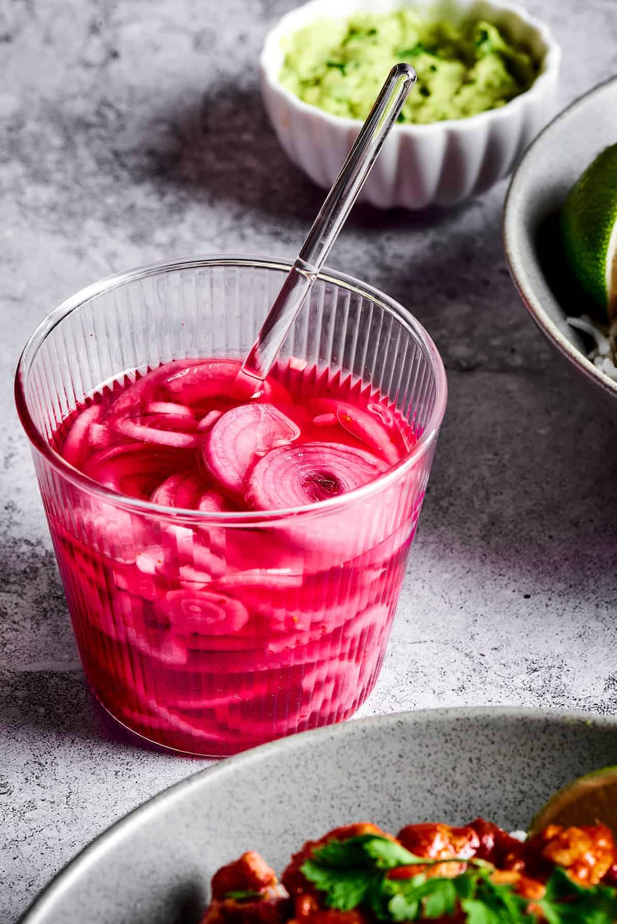 pickled red onions in a jar