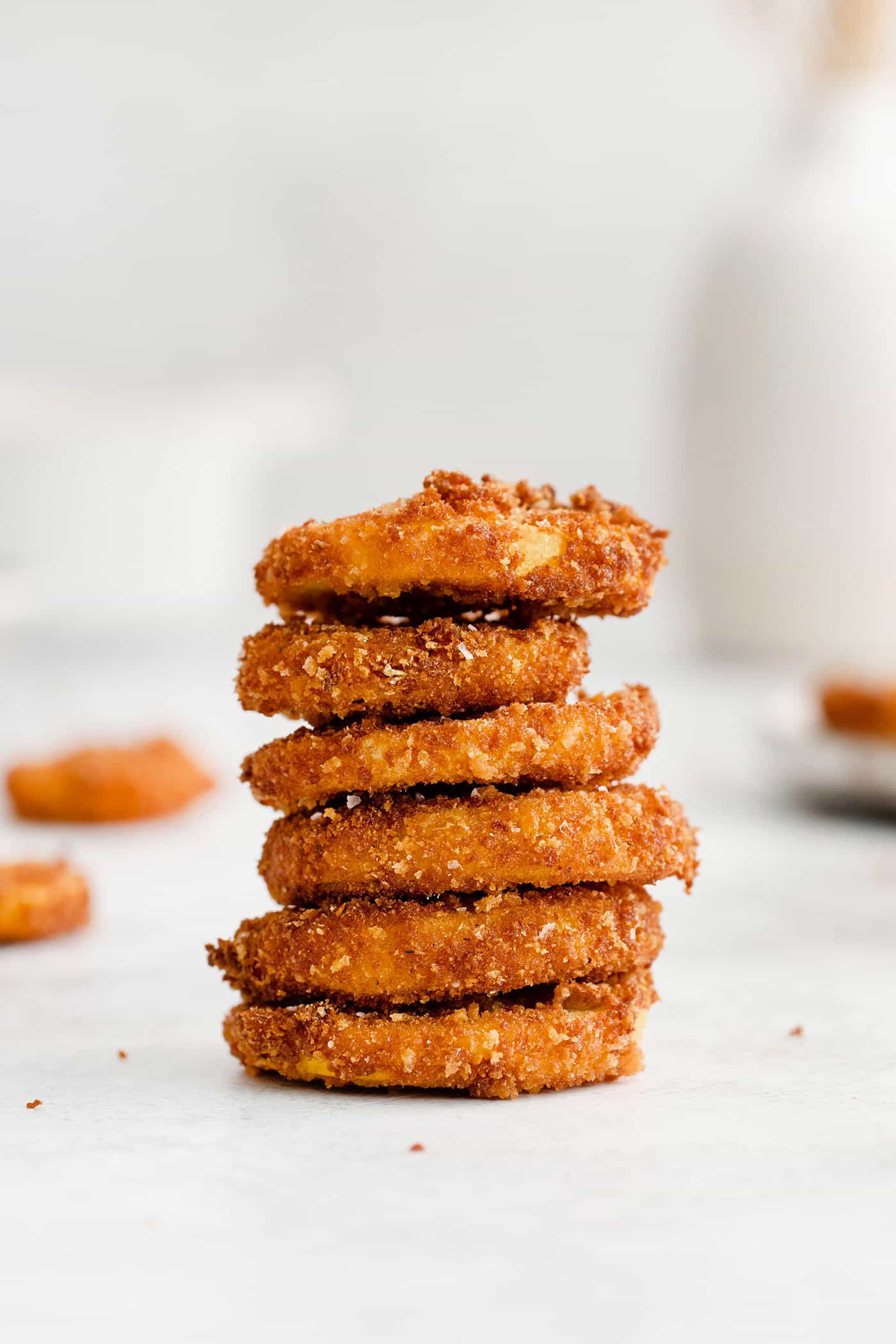 A pile of fried yellow squash rounds