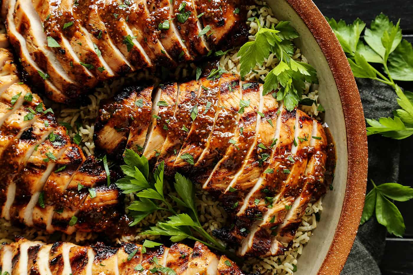 grilled turkey tenderloins, sliced, on a platter