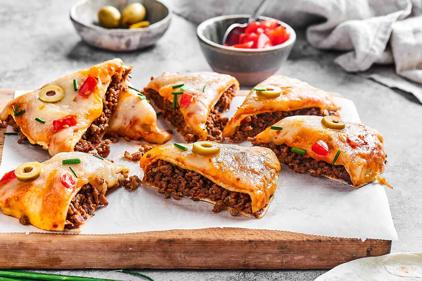 Mexican pizza on a cutting board