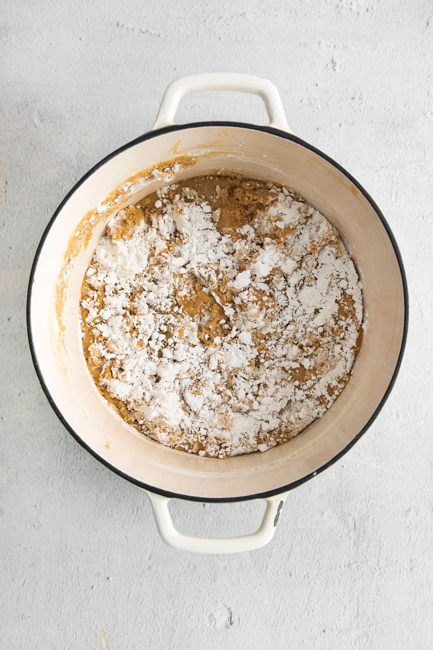 Powdered sugar stirred into a peanut butter mixture