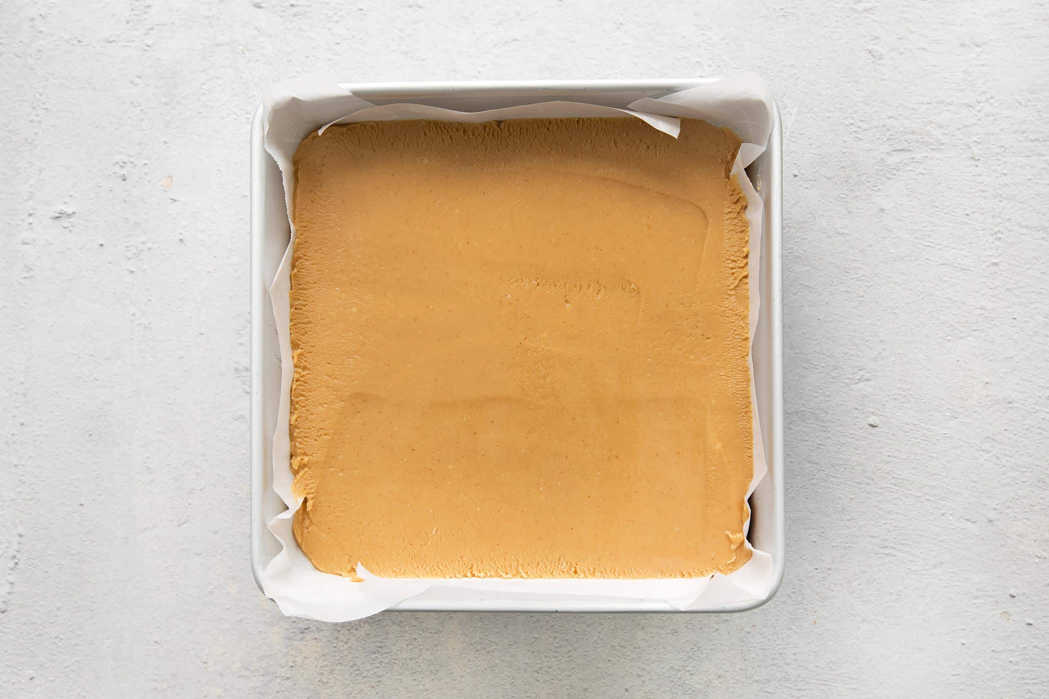 peanut butter fudge spread in a pan