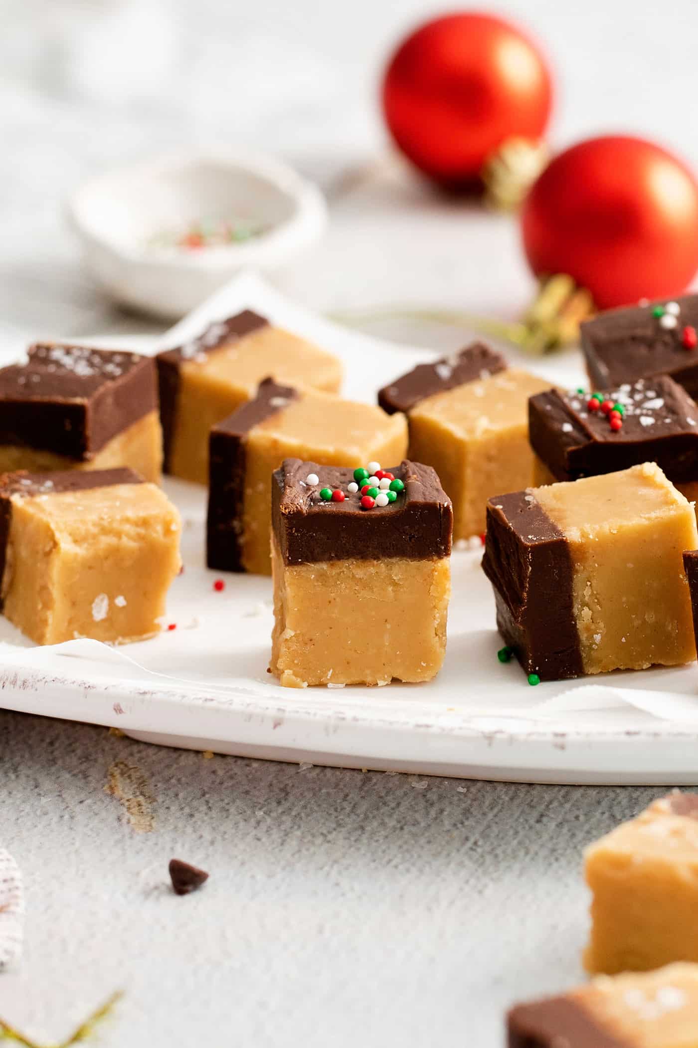 Pieces of buckeye fudge with Christmas sprinkles