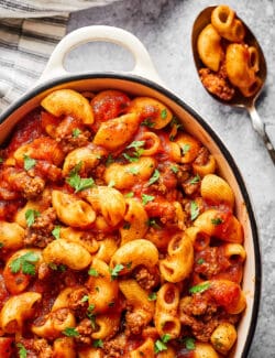 a white casserole dish with beefaroni