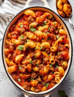 overhead photo of beefaroni in a white casserole dish