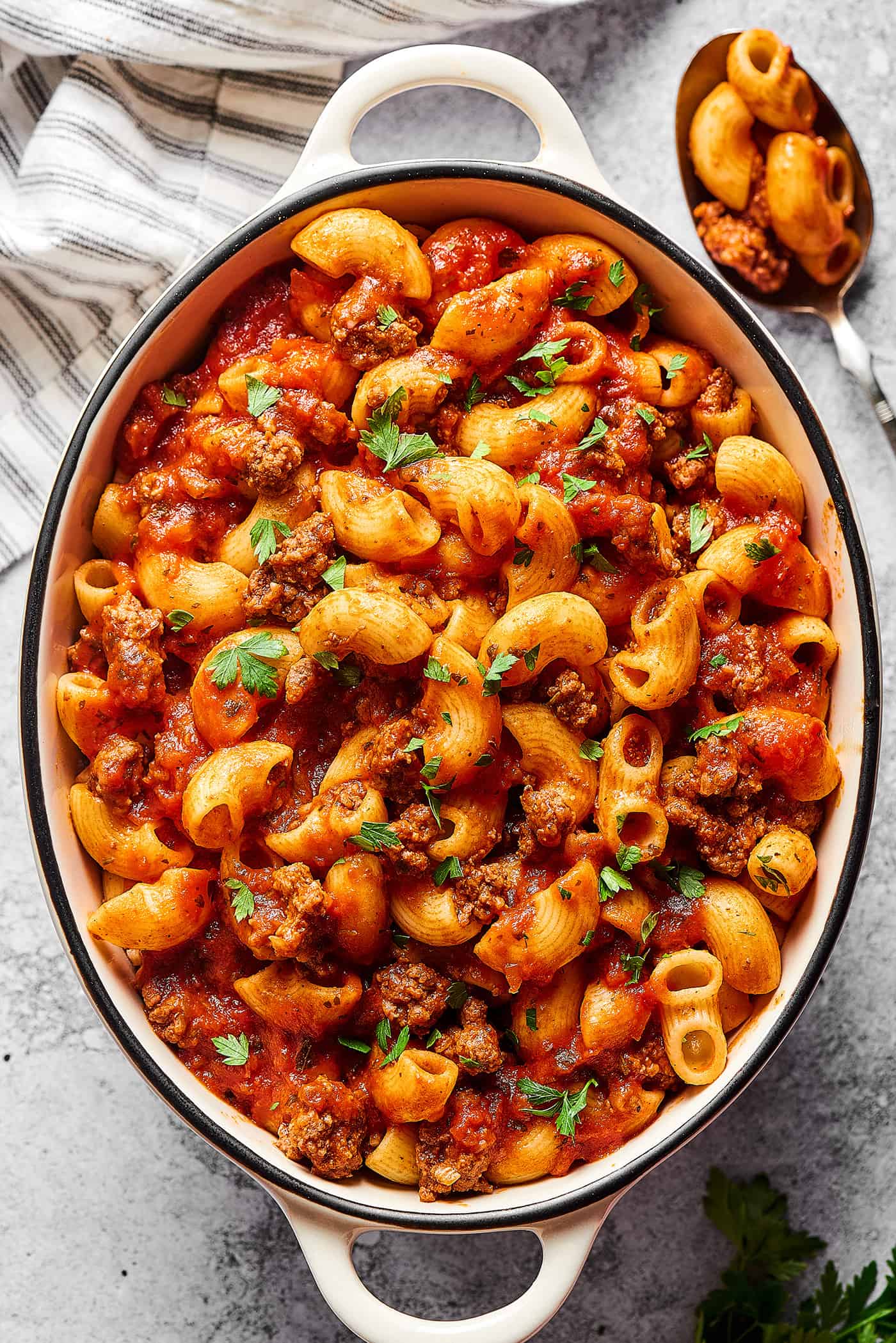 overhead photo of beefaroni in a white casserole dish