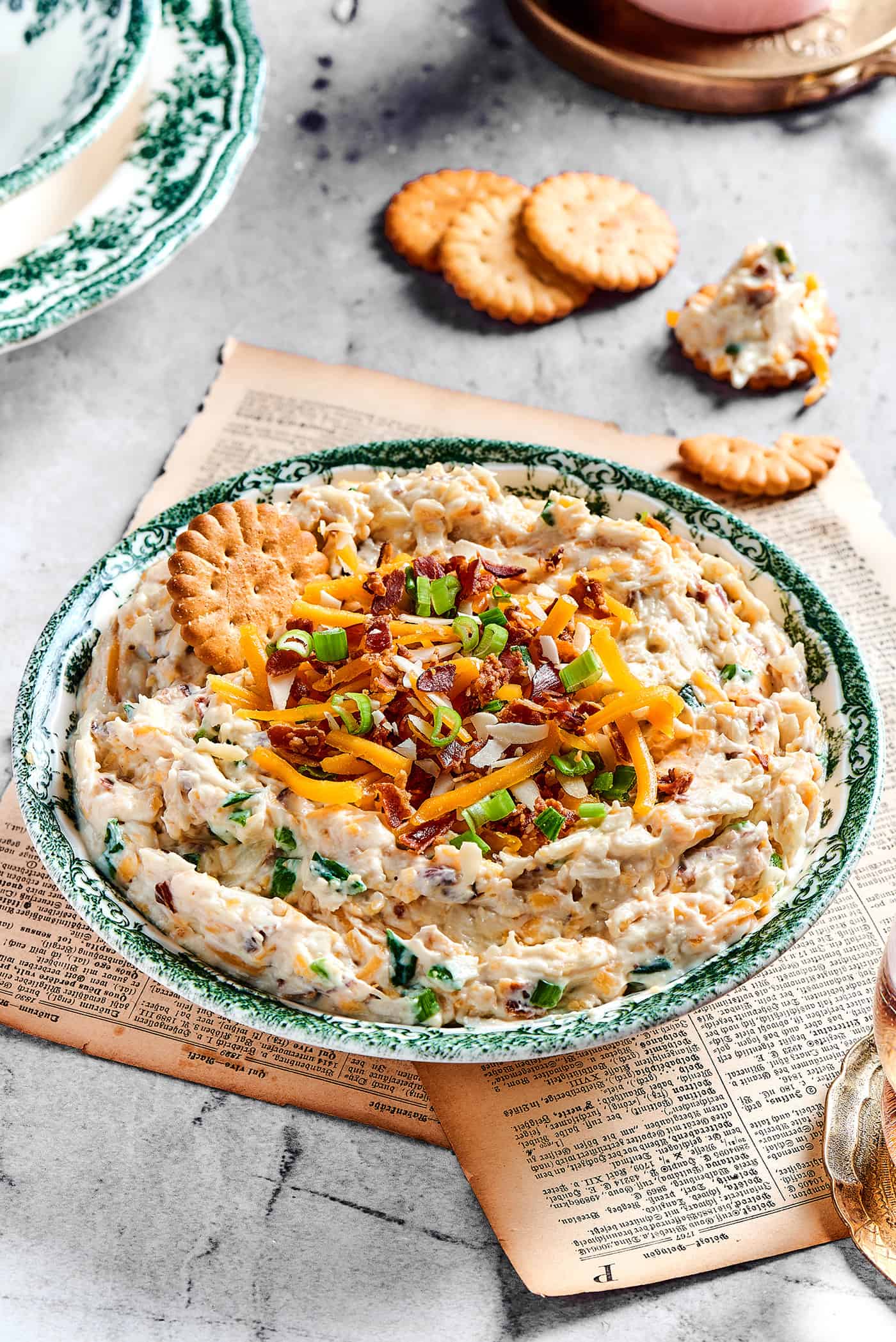 million dollar dip in a serving bowl, with crackers