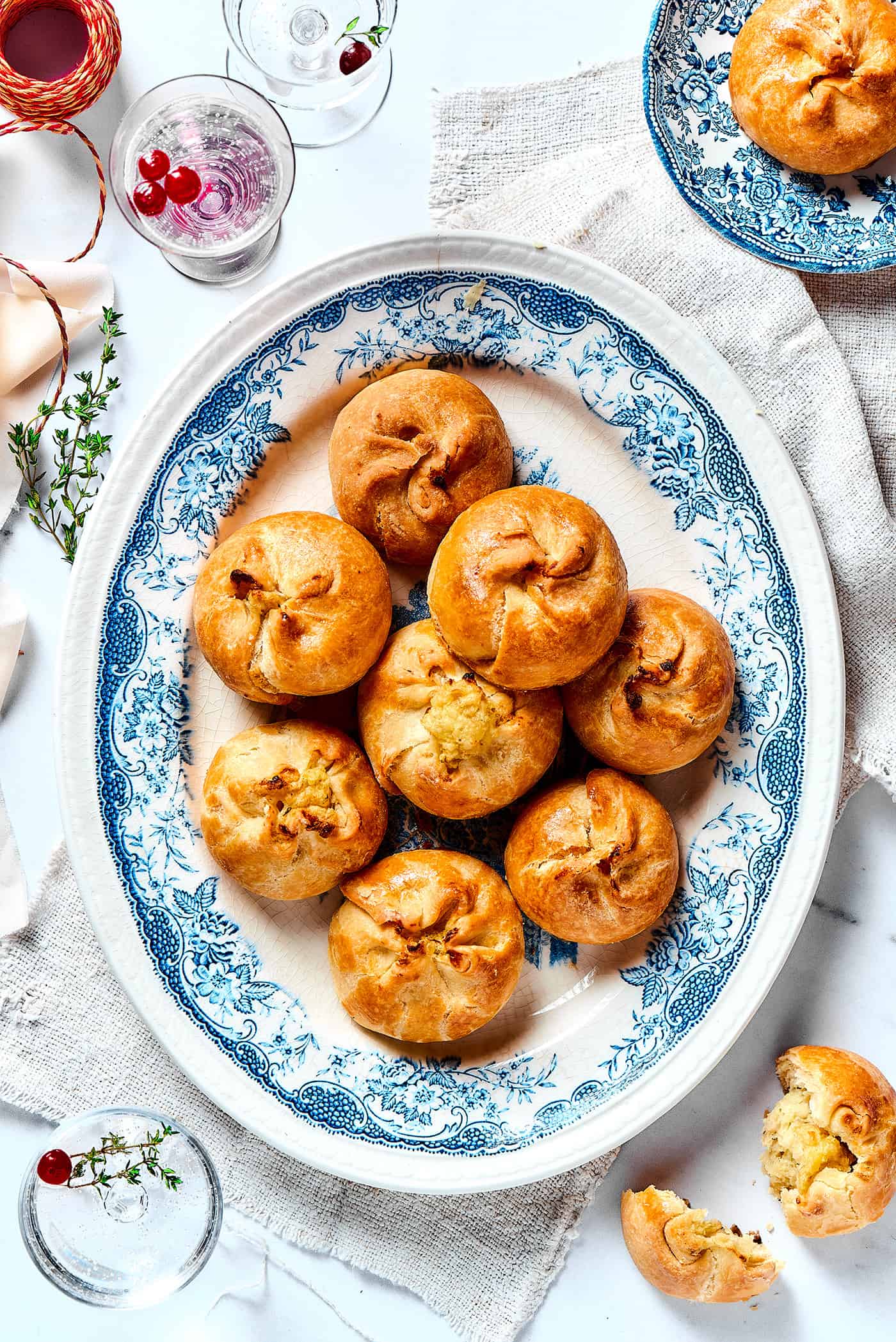 overhead photo of a table with a platter of potato knishes