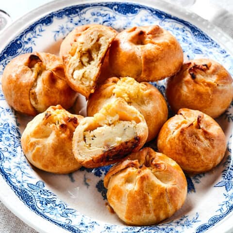 a platter of New York knishes, with one cut in half