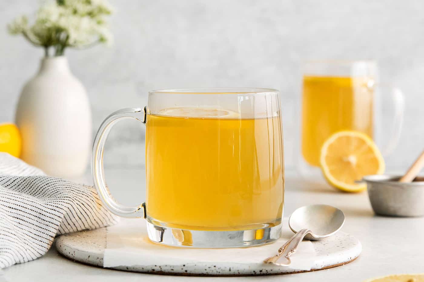 A clear mug of Starbucks medicine ball tea