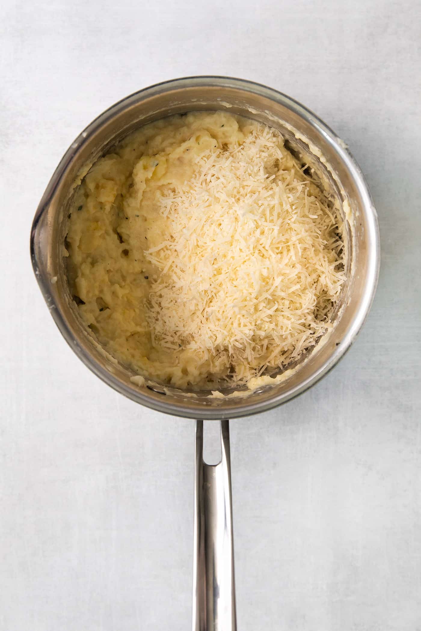 Mashed parsnips in a saucepan