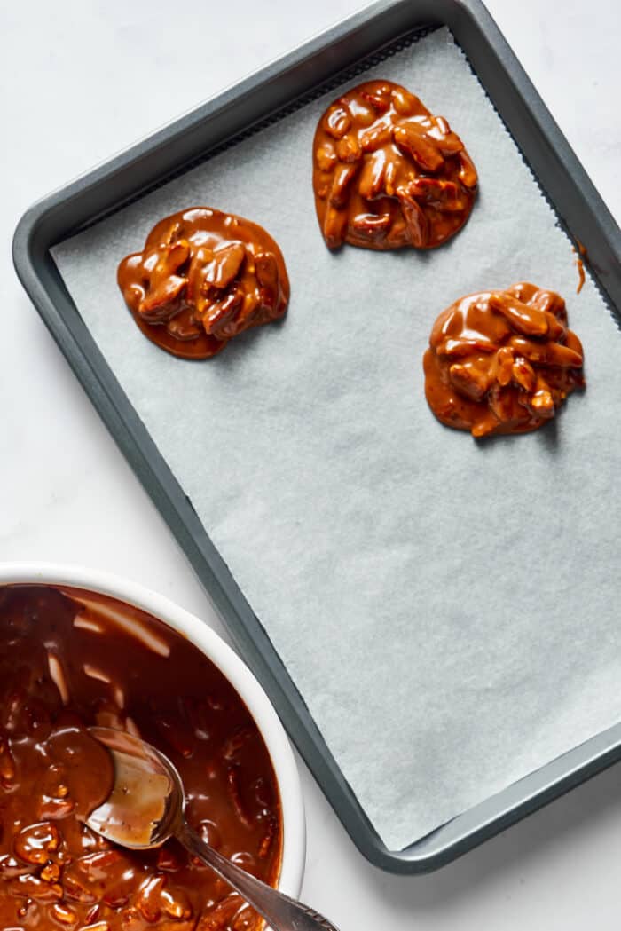 Three pralines on a baking sheet