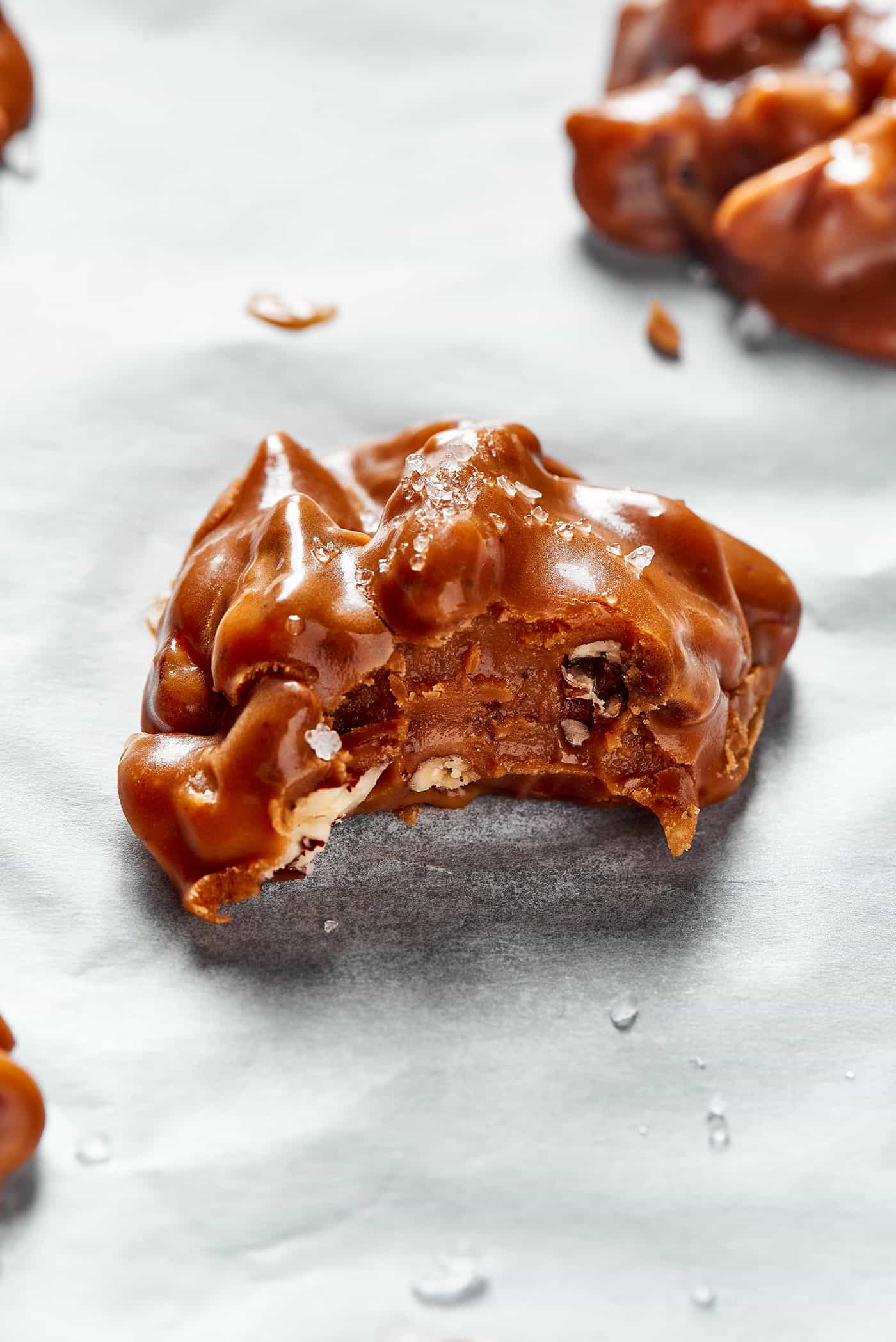 a bite out of a pecan praline