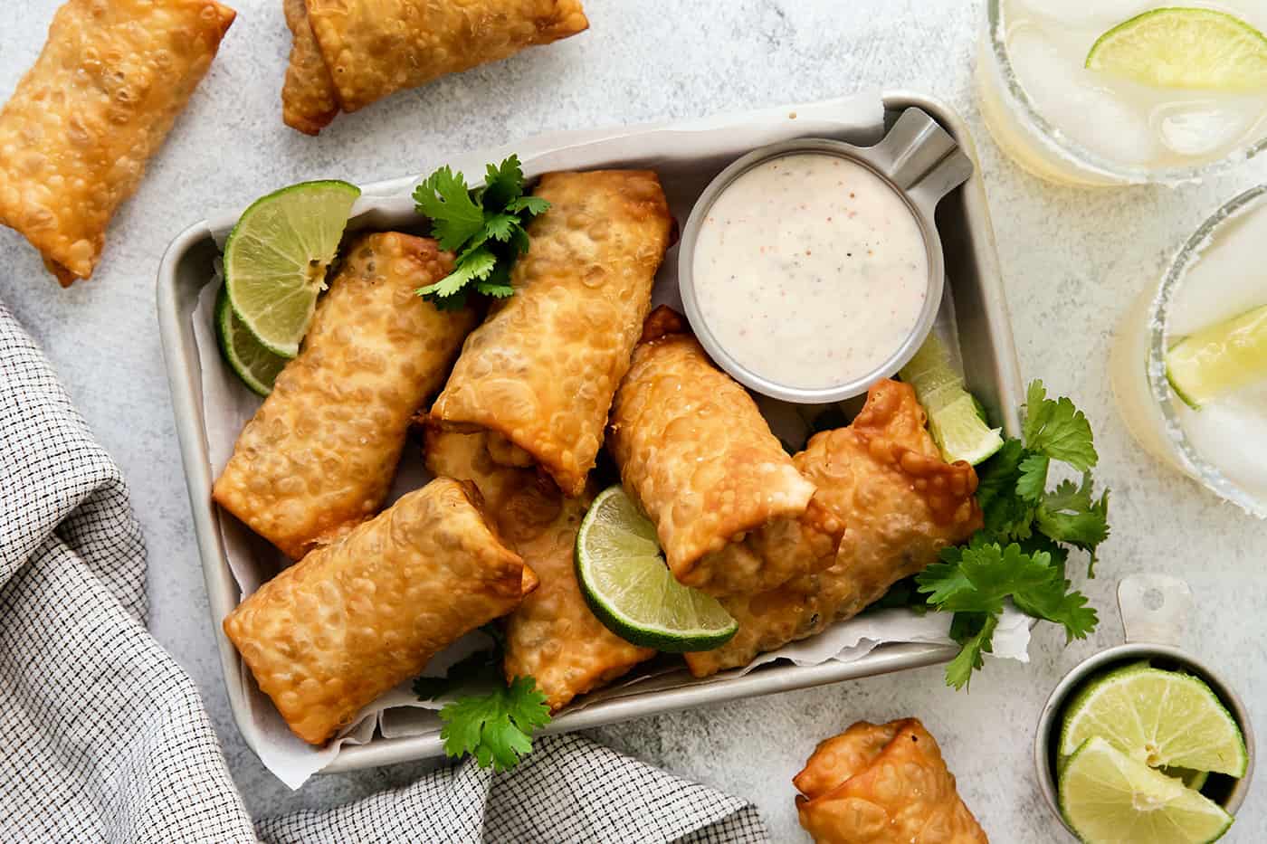 egg rolls with southwestern flavors, piled in a pan
