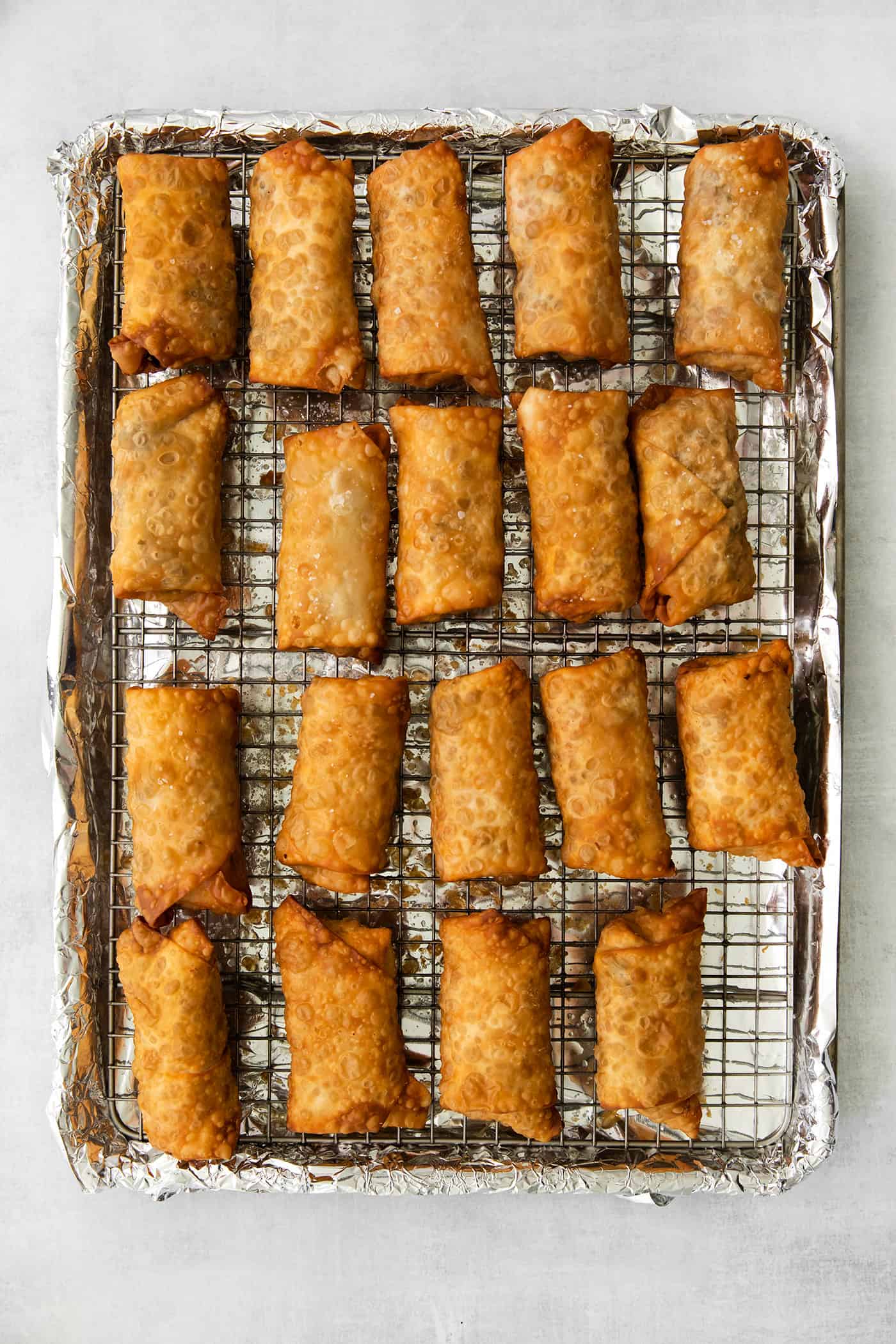 Southwest chicken egg rolls on a cooling rack