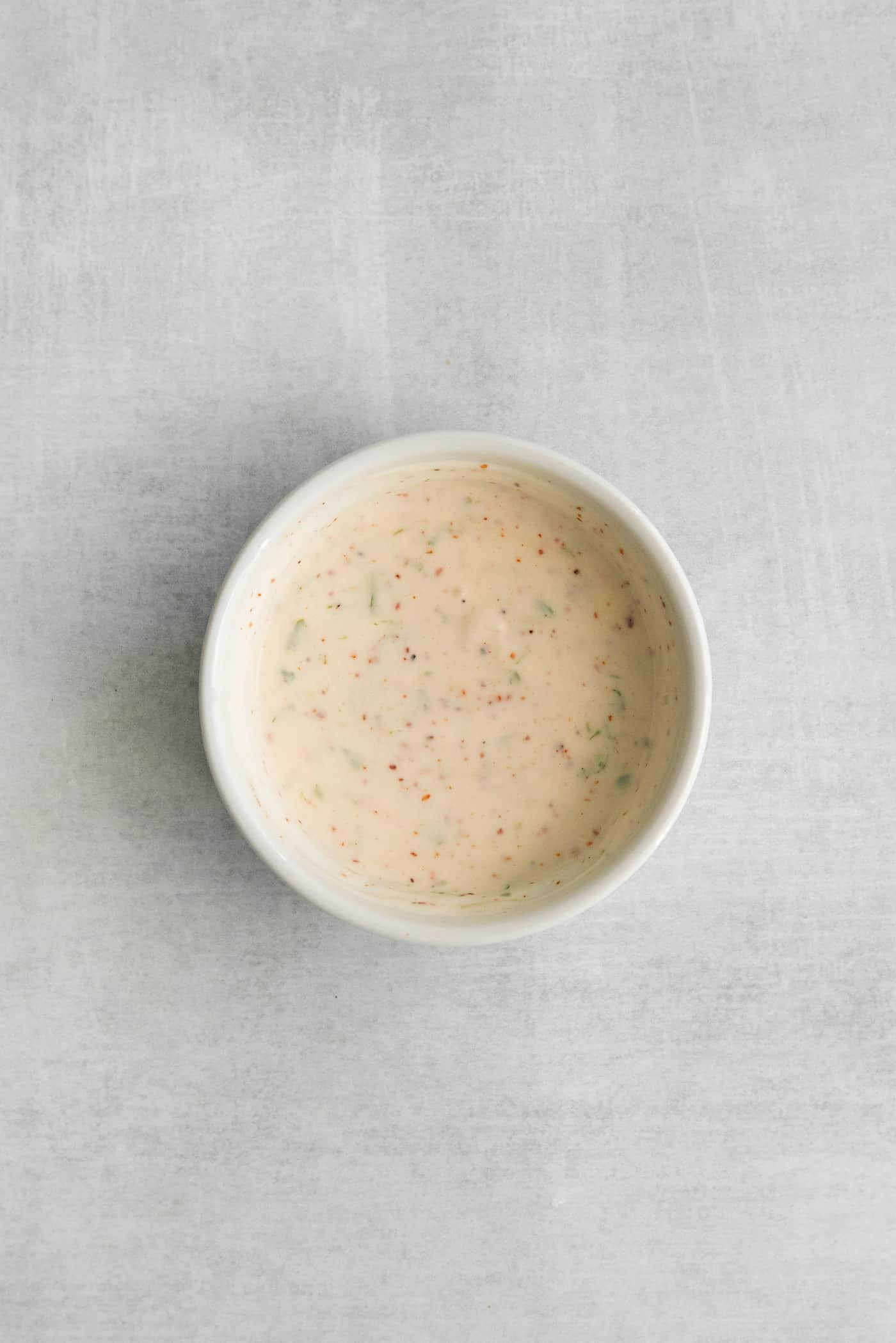 Lime crema in a white bowl