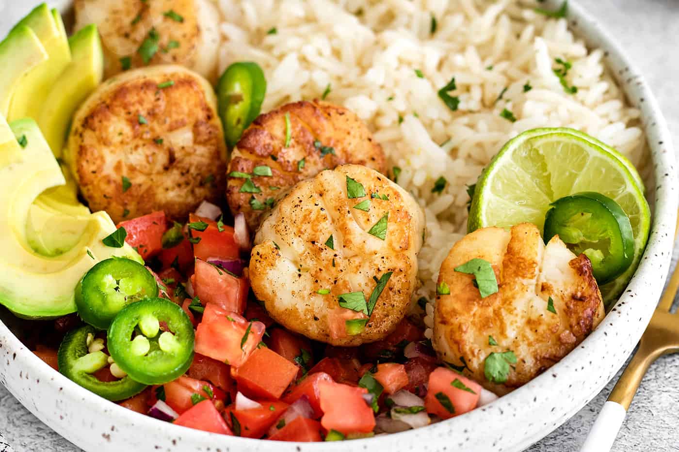 Close-up of a tex mex rice bowl with scallops