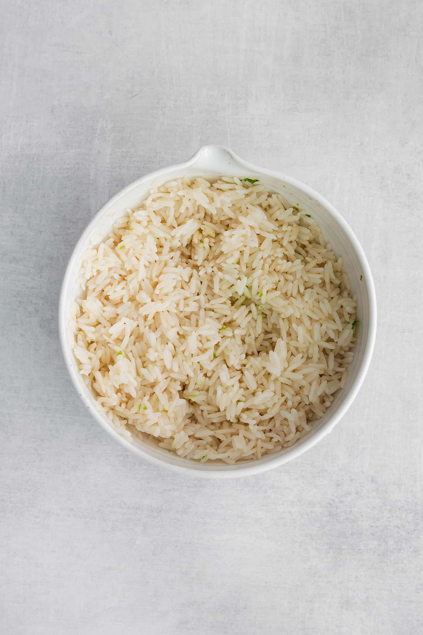 Lime rice in a white bowl