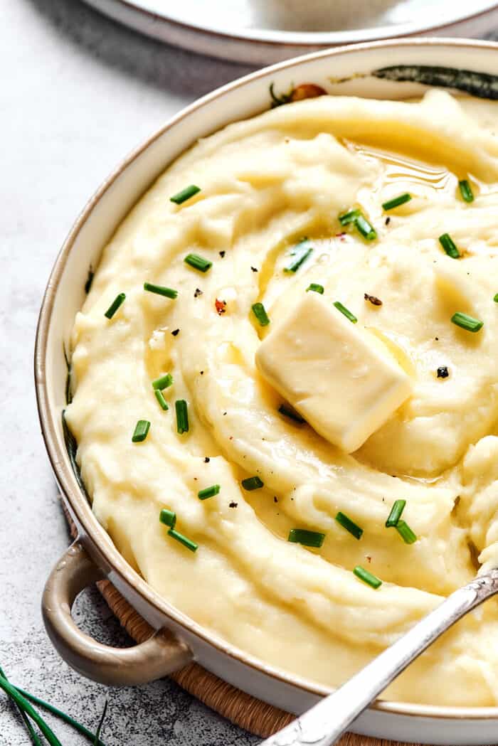 side view of bowl of mashed potatoes with buttermilk