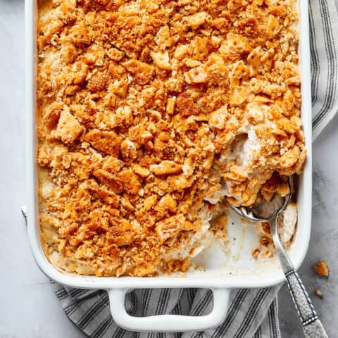 a white serving dish of chicken poppy seed casserole