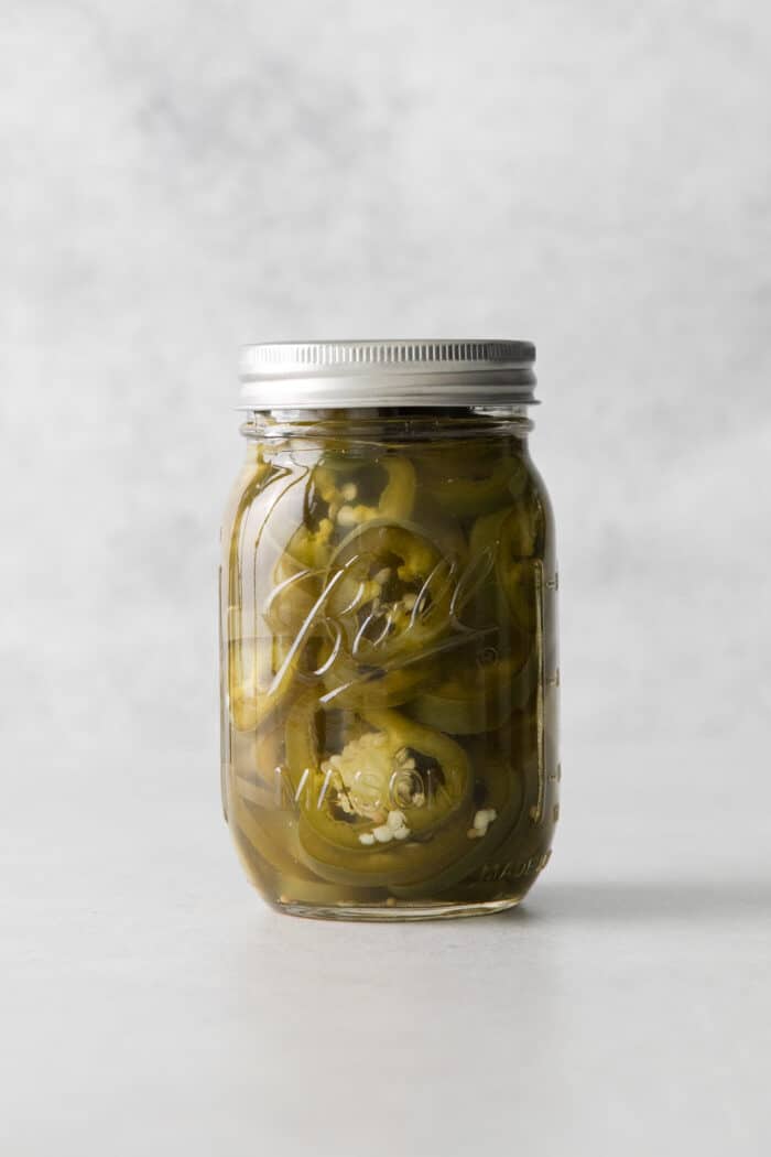 A jar of pickled jalapenos