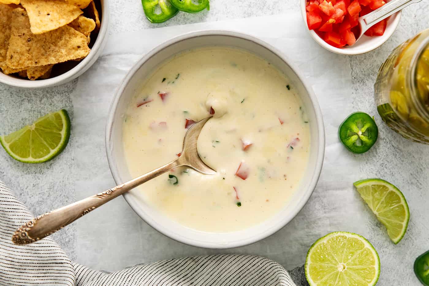 Overhead view of a bowl of white cheese dip
