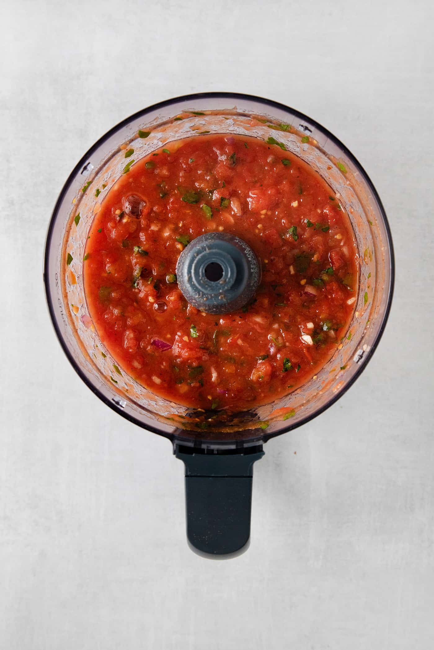 Blender salsa in a food processor