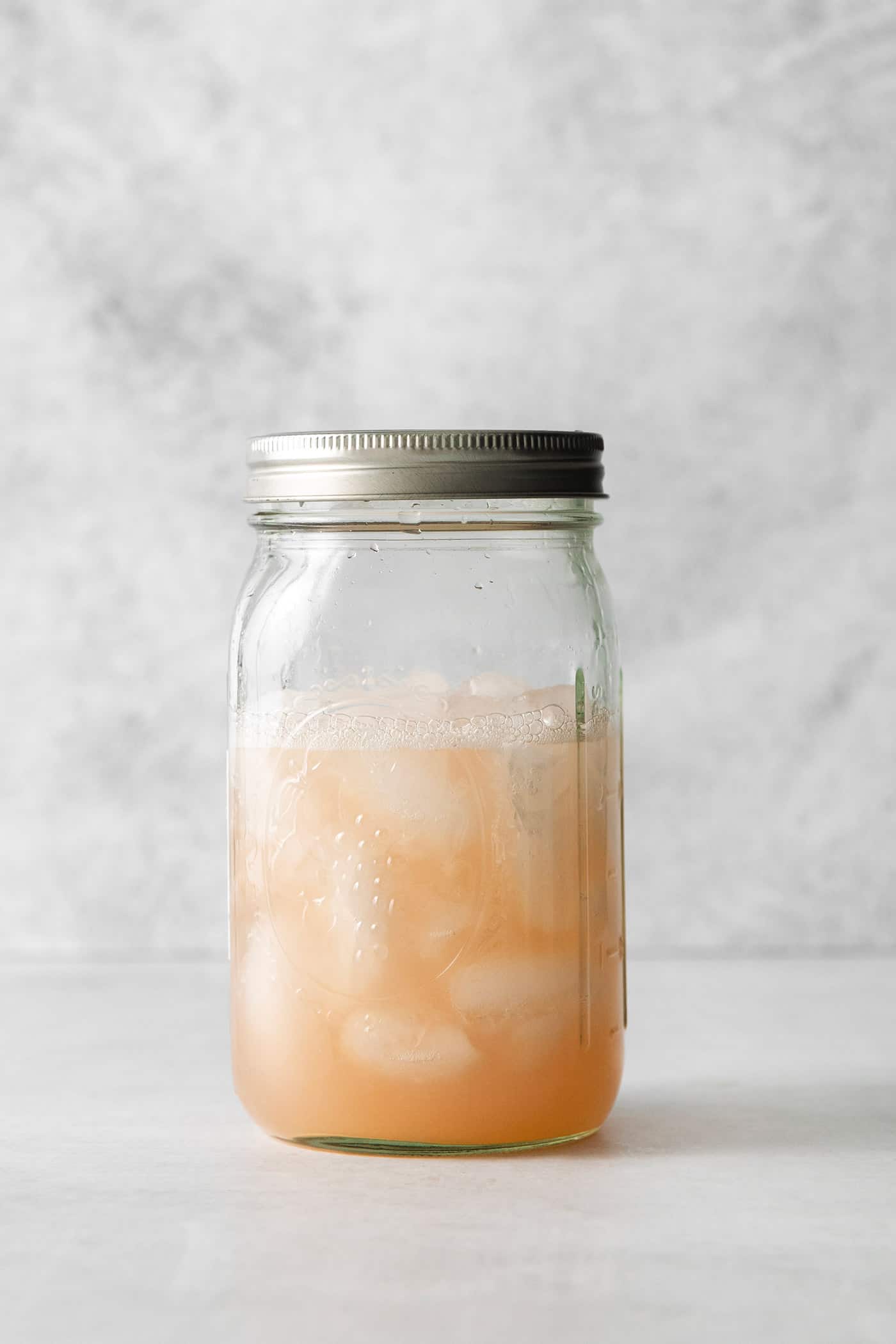 Grapefruit cocktail in a mason jar