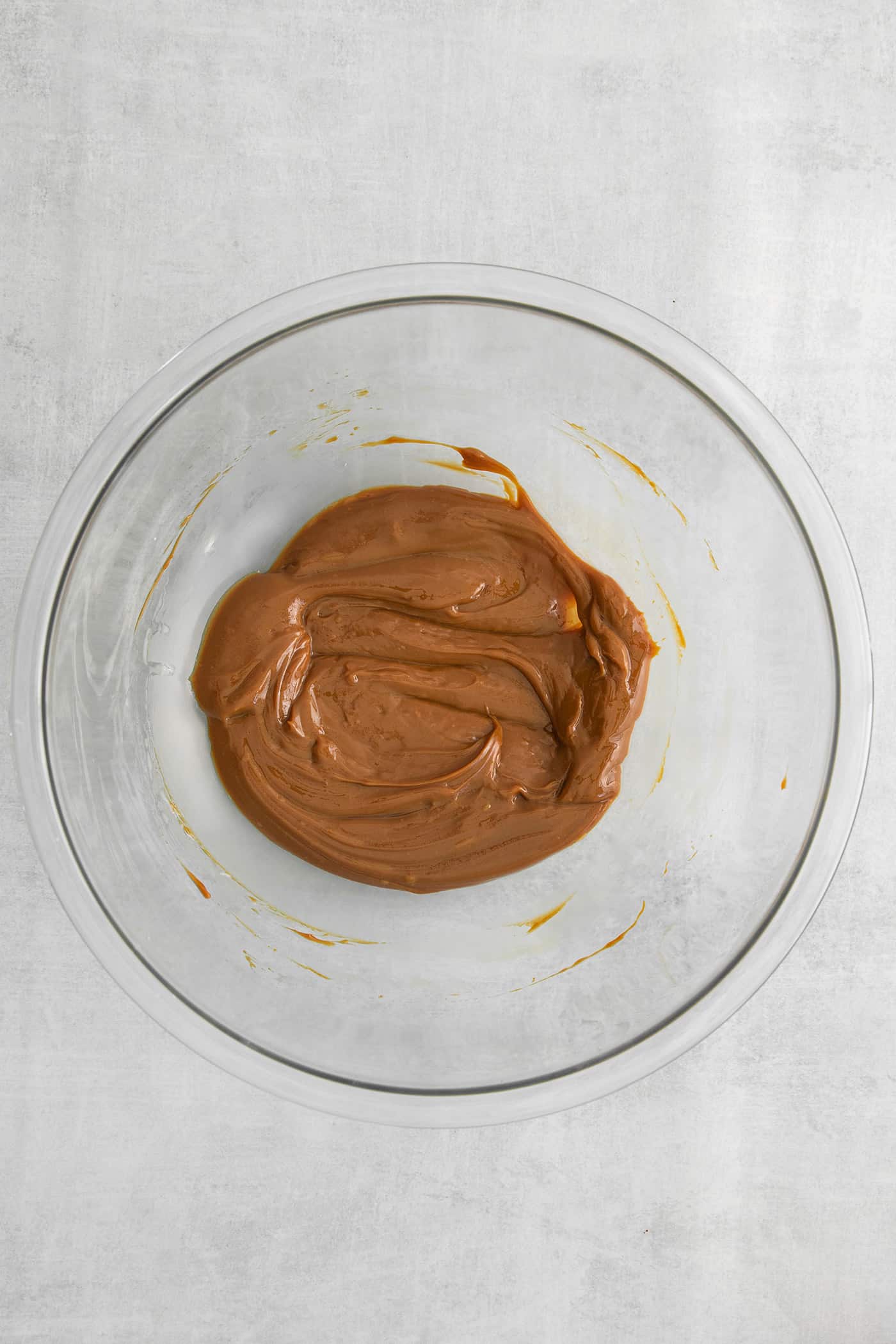 Melted dulce de leche in a bowl