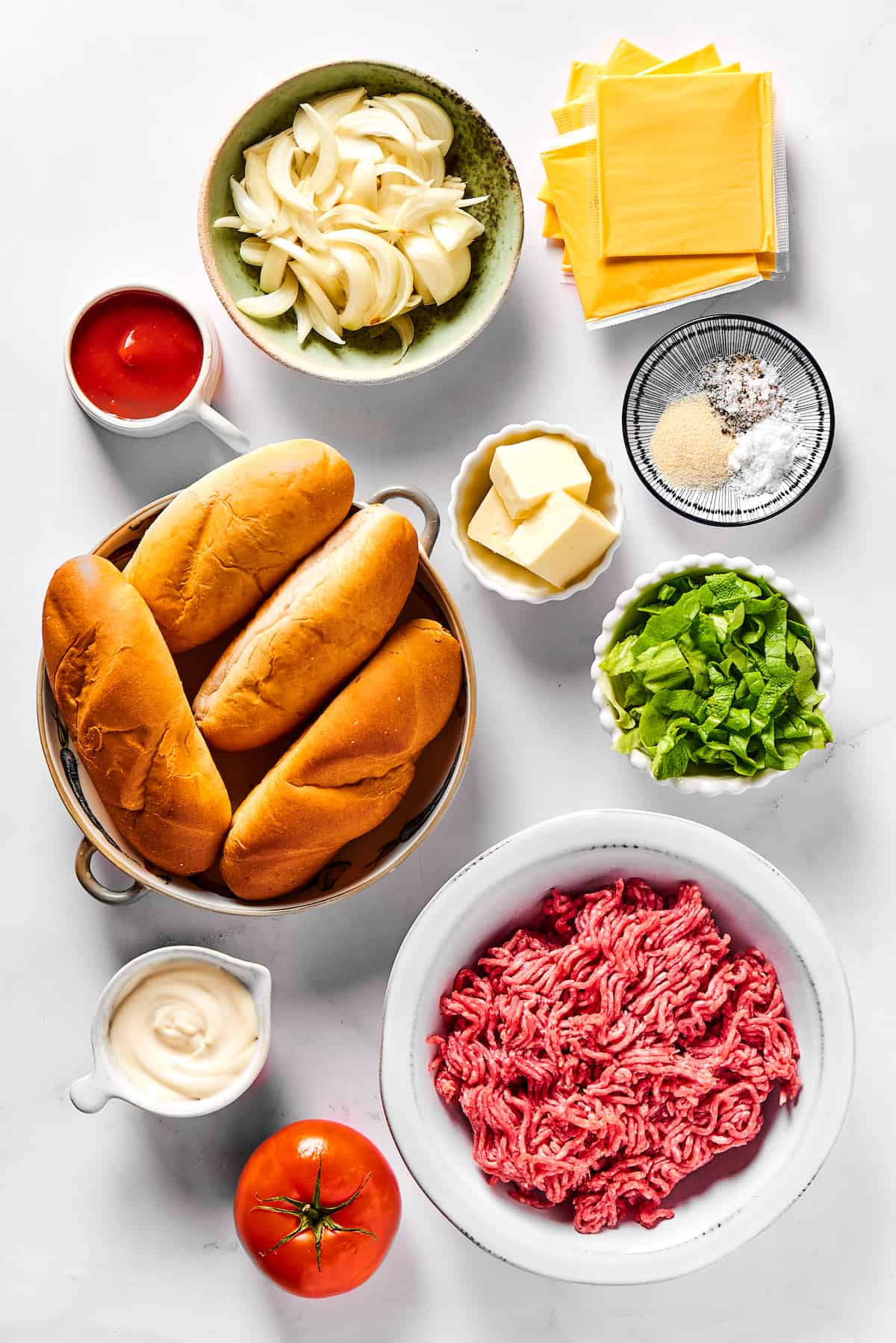 Overhead view of chopped cheese sandwich ingredients