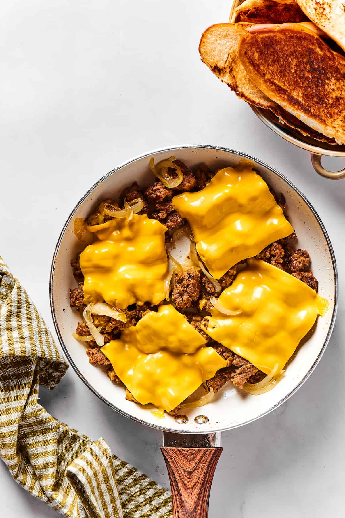 Crumbled ground beef topped with yellow American cheese