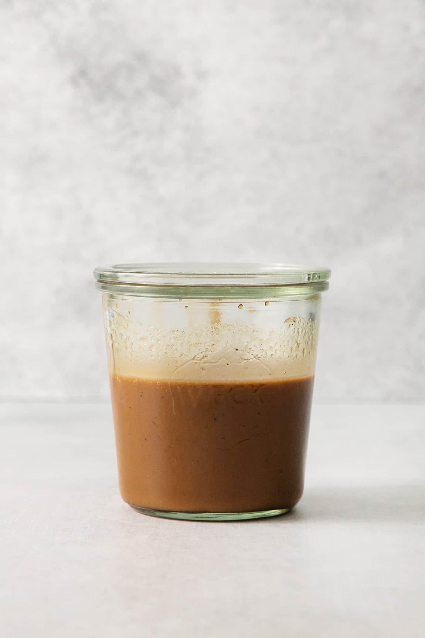 Homemade balsamic vinaigrette in a jar