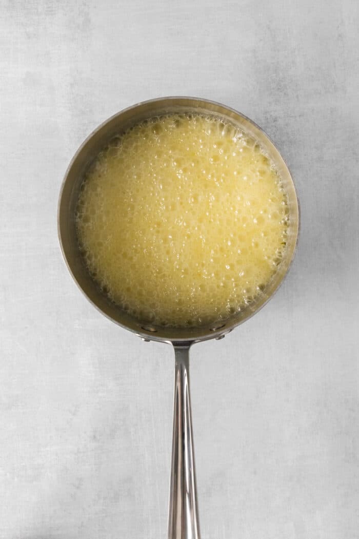 Overhead view of bubbling buttermilk caramel sauce