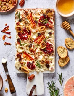a butter board with bacon butter, plus crostini, honey, and nuts