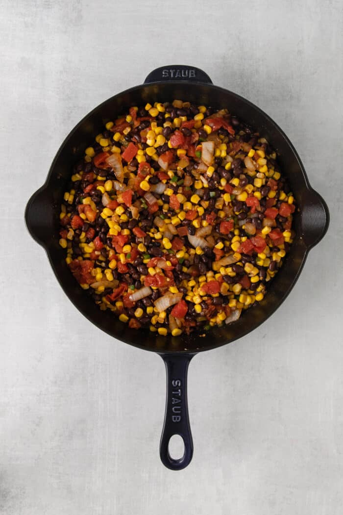 Black beans, rotel, and corn in a skillet