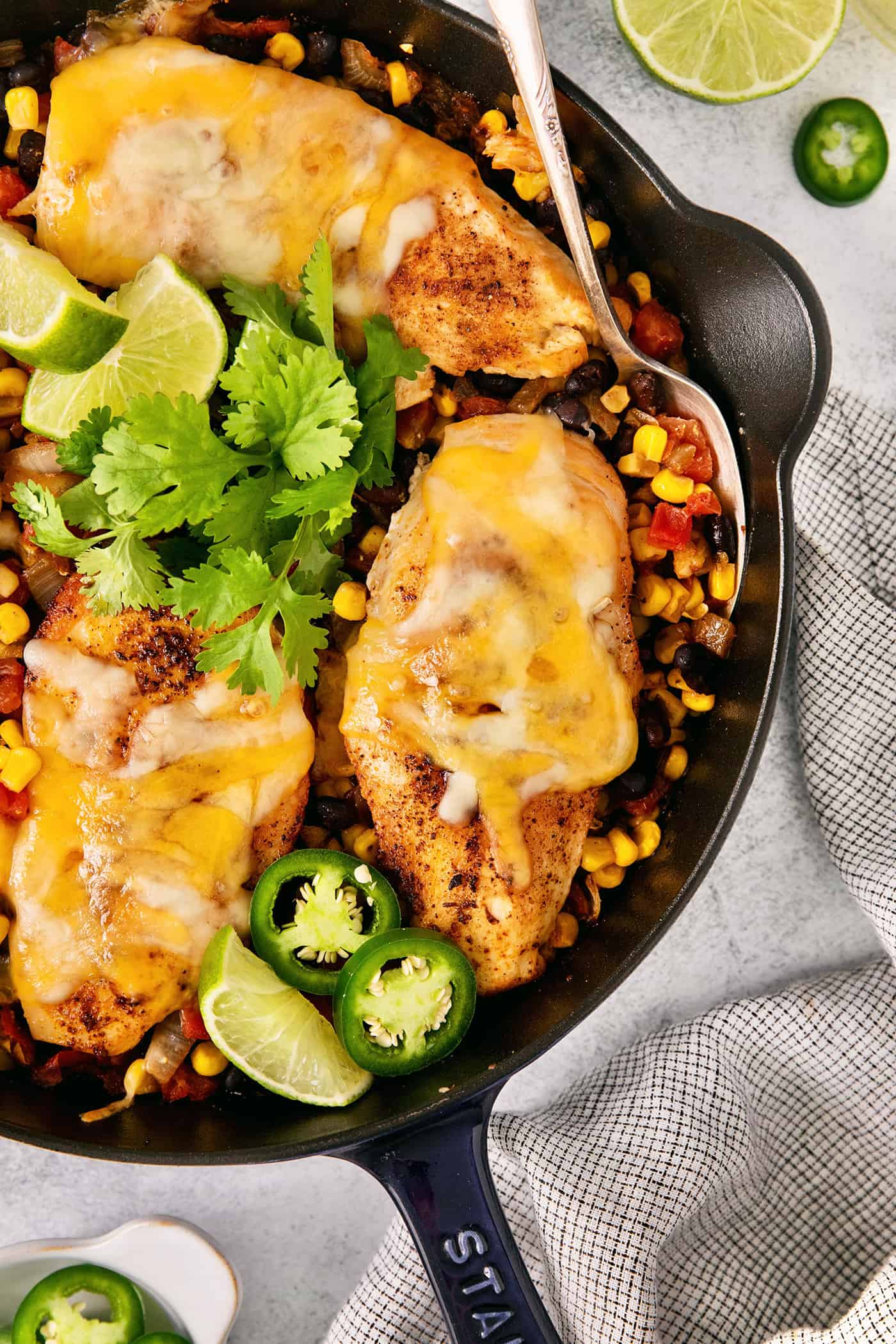 Cowboy chicken skillet with parsley and lime slices