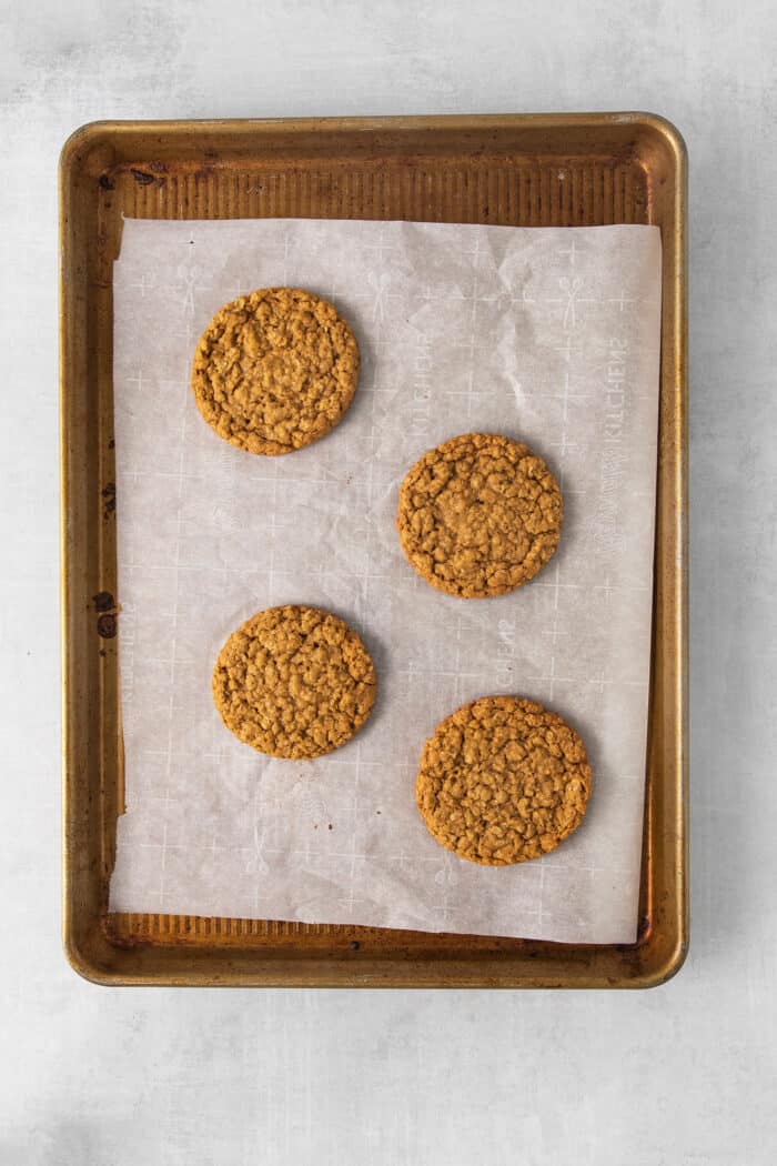 Baked oatmeal cookies on a baking sheet