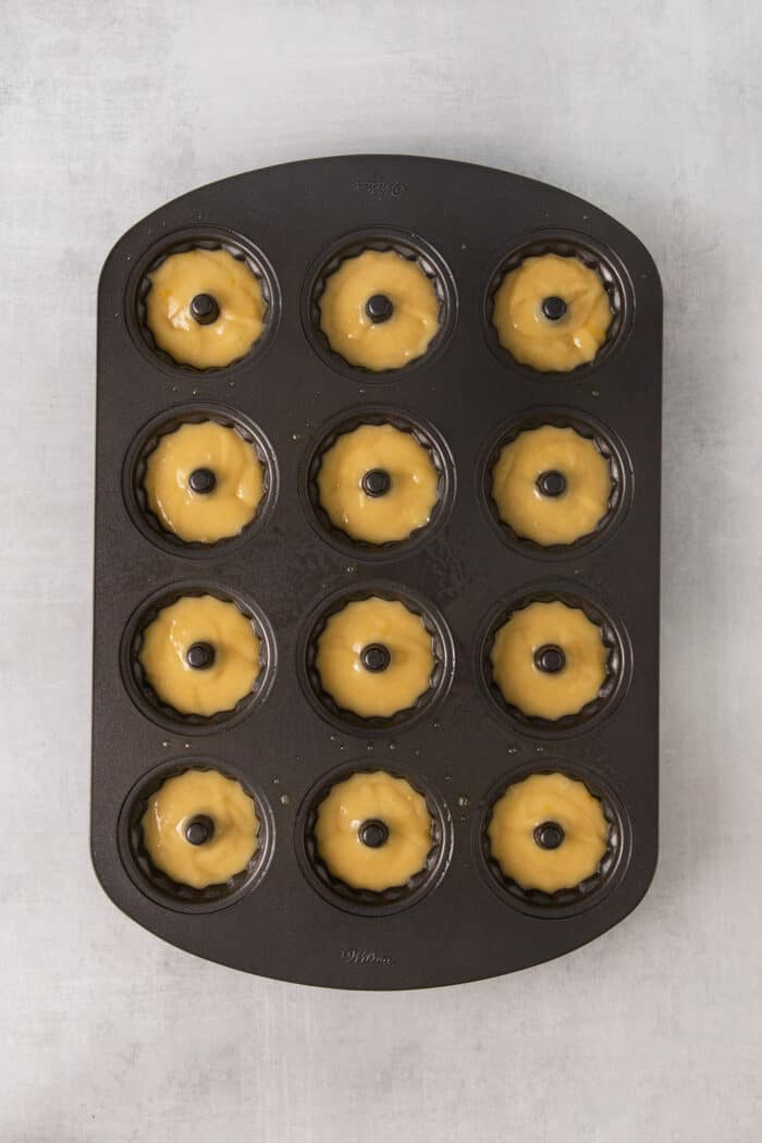 Cake batter in mini bundt pans