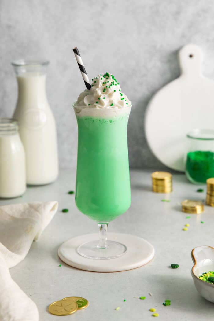 A shamrock shake topped with whipped cream