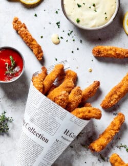 A newspaper funnel of chicken fries