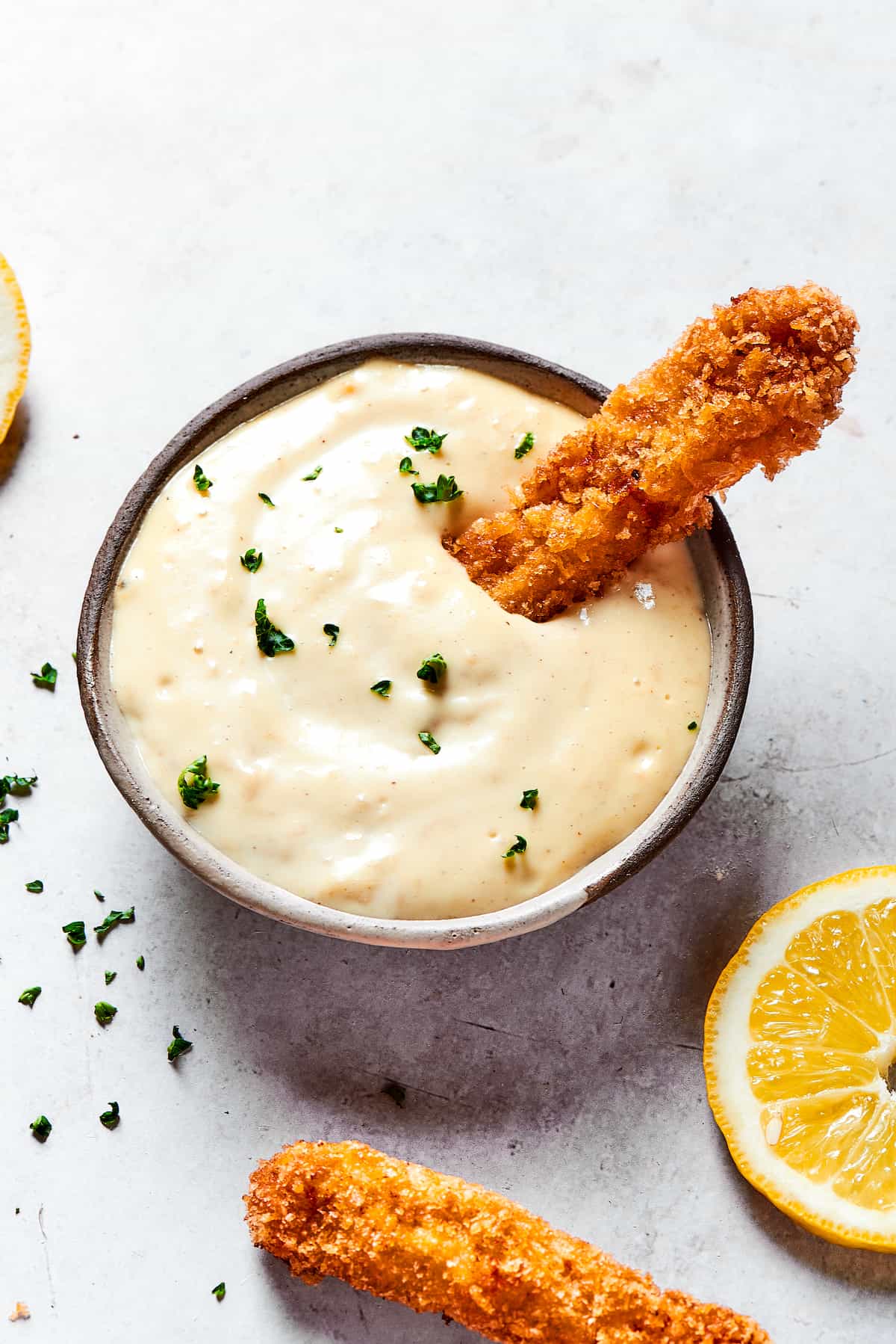 A chicken fry dipped in garlic aioli