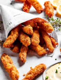 chicken fries in a newspaper cone