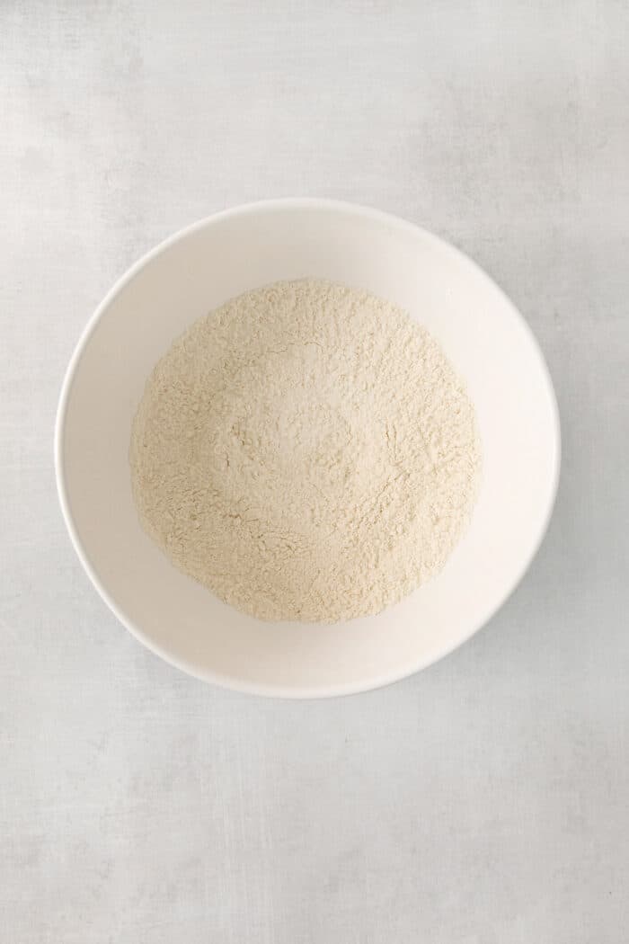 Dry ingredients are mixed for waffle batter.