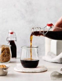 Brown sugar syrup being poured into a glass