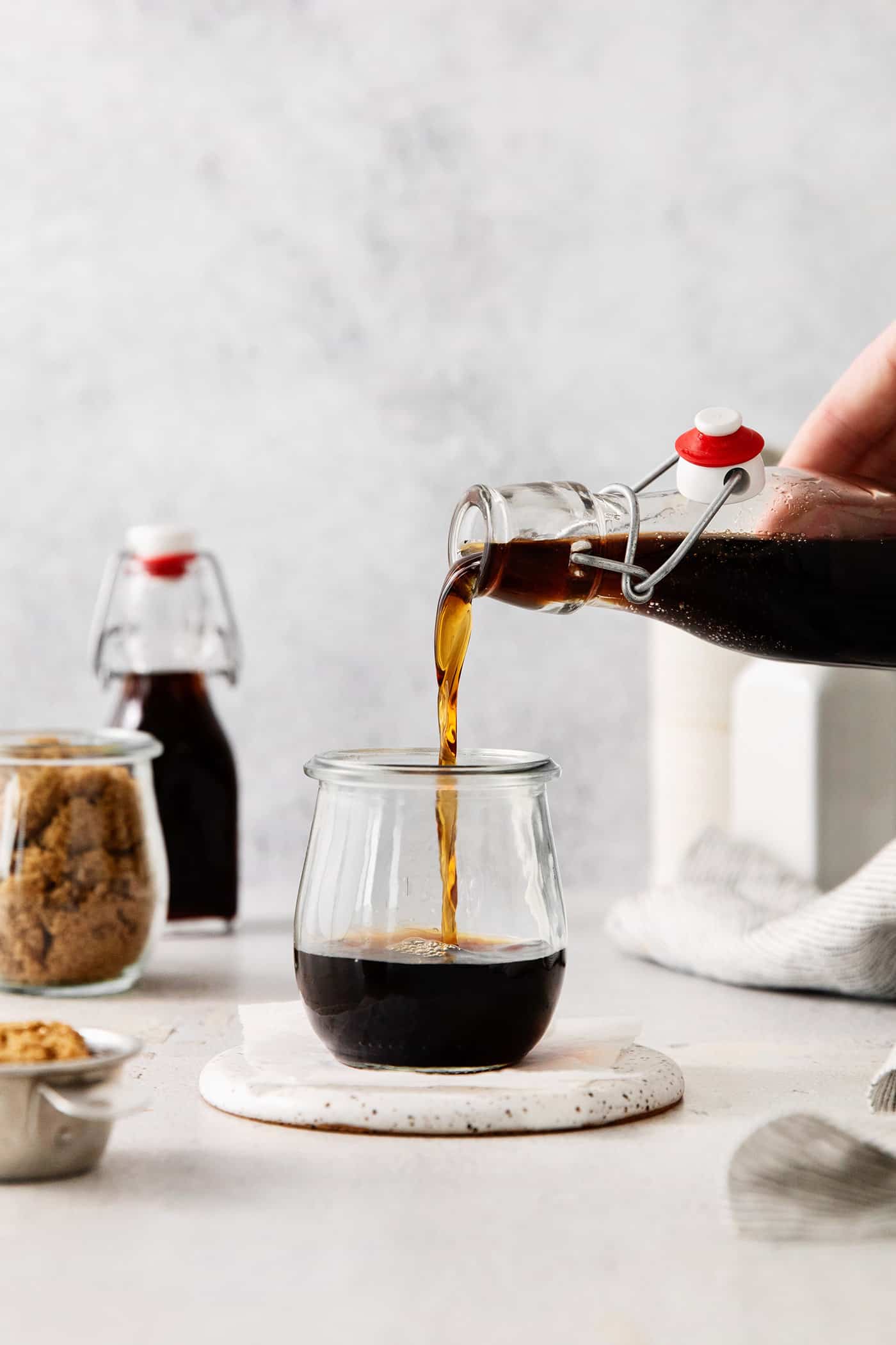 Brown sugar syrup being poured into a glass