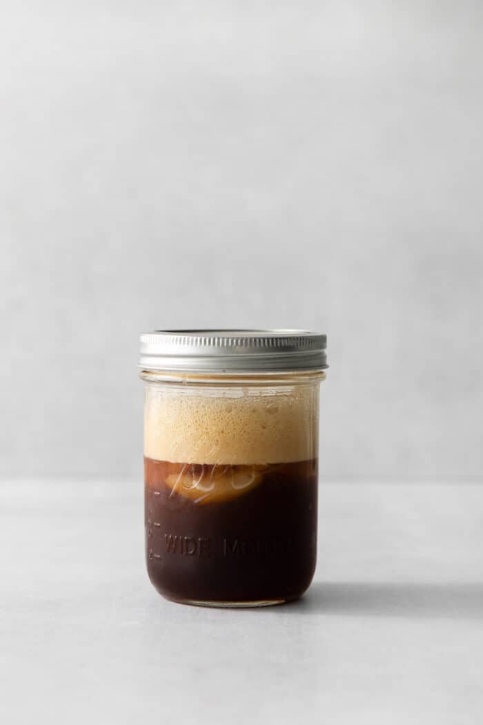 Shaken espresso in a pint jar