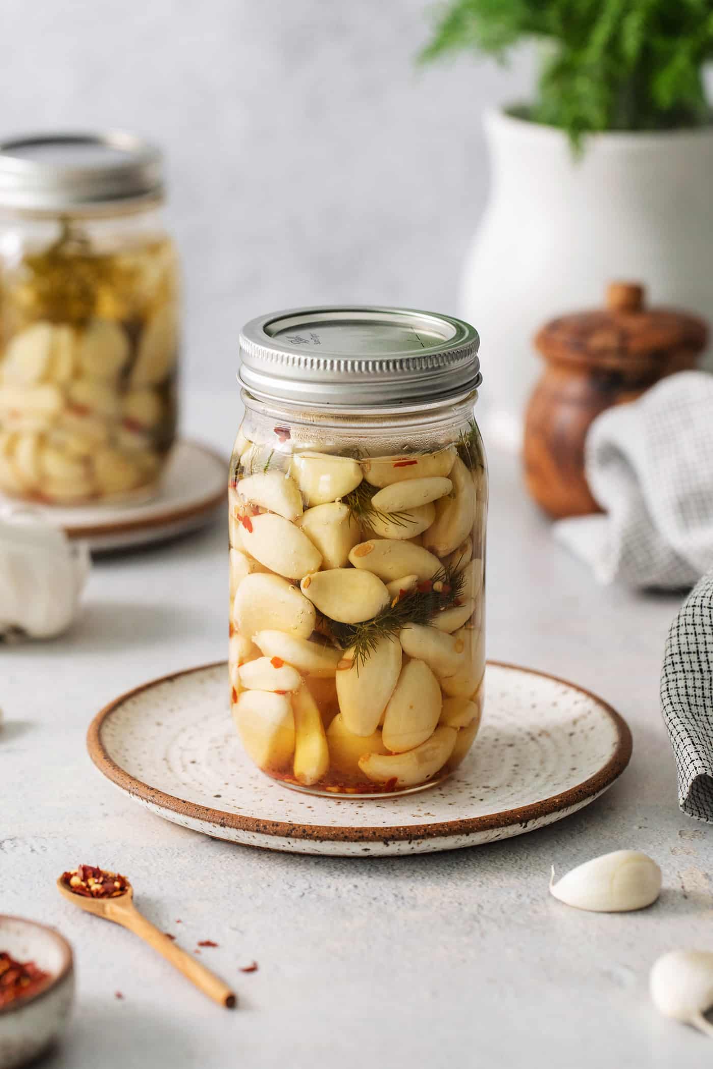 A jar of pickled garlic cloves